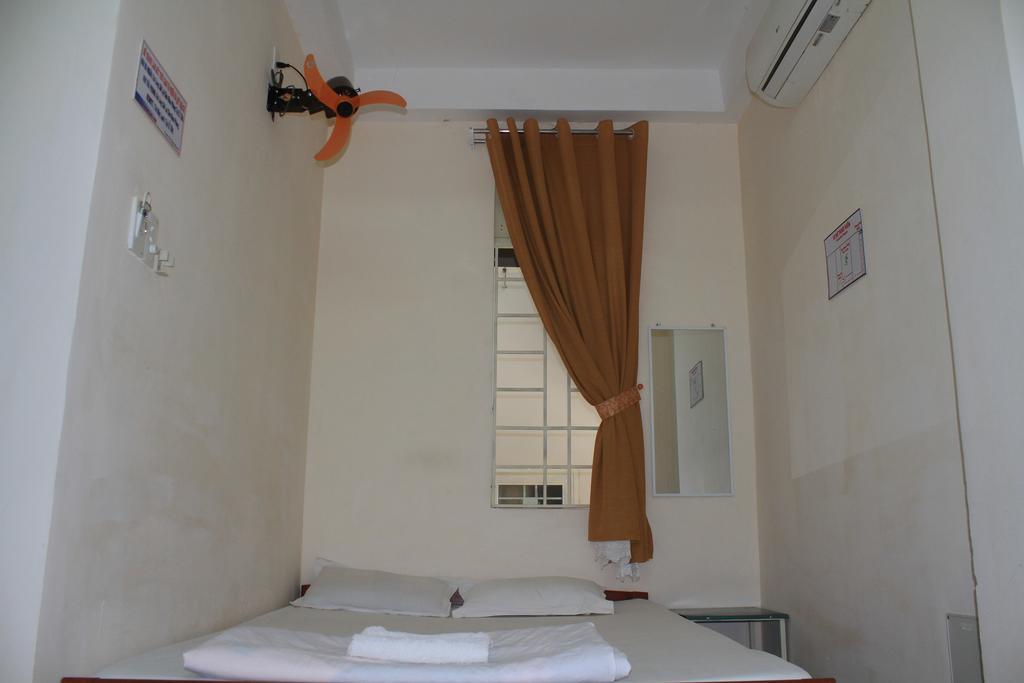 Ngoc Mai Guesthouse Буон Ма Туот Стая снимка